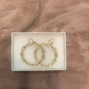 White and gold hoop earrings